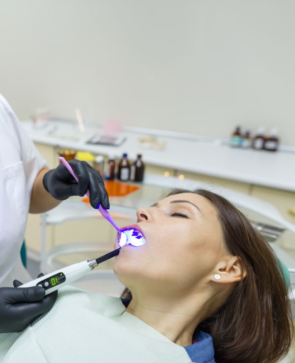 man smiling in dentists chair