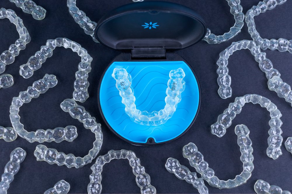 man smiling in dentists chair